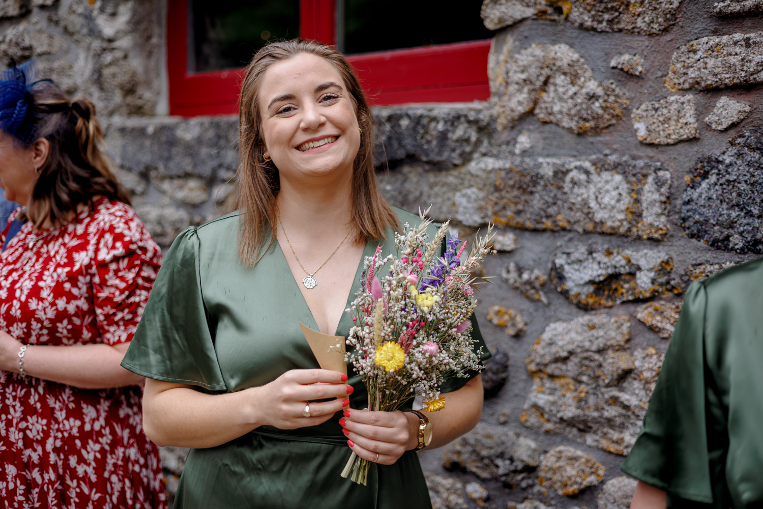 bridesmaid holding bouquet