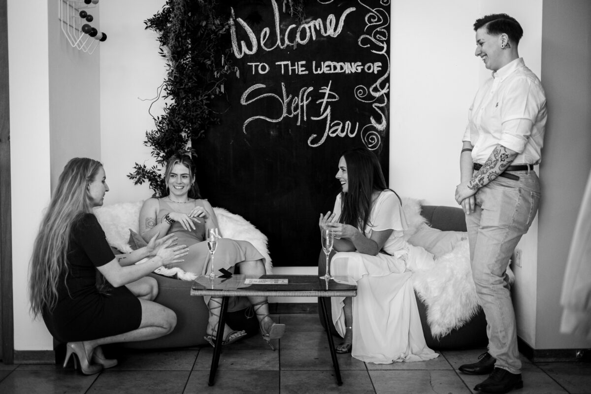 black & white picture of Wedding guests at a bedruthan steps wedding