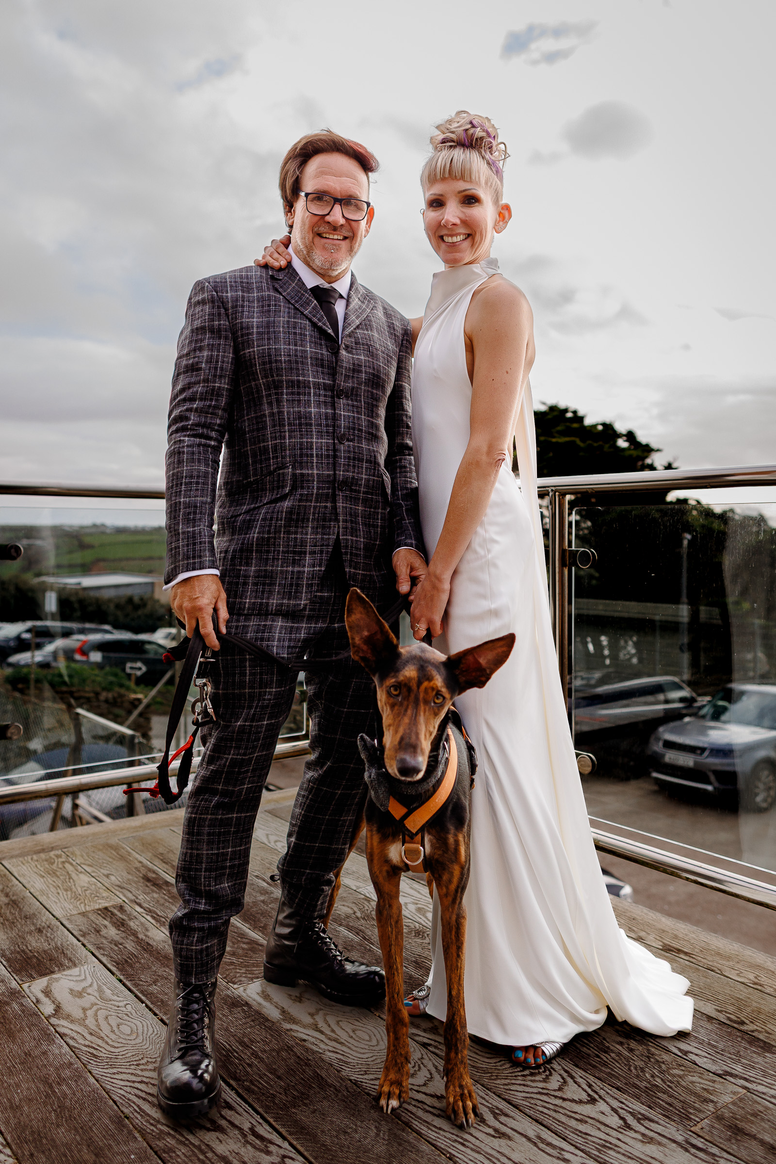 Chester the dog joining Steff and Jan for photographs on their wedding day