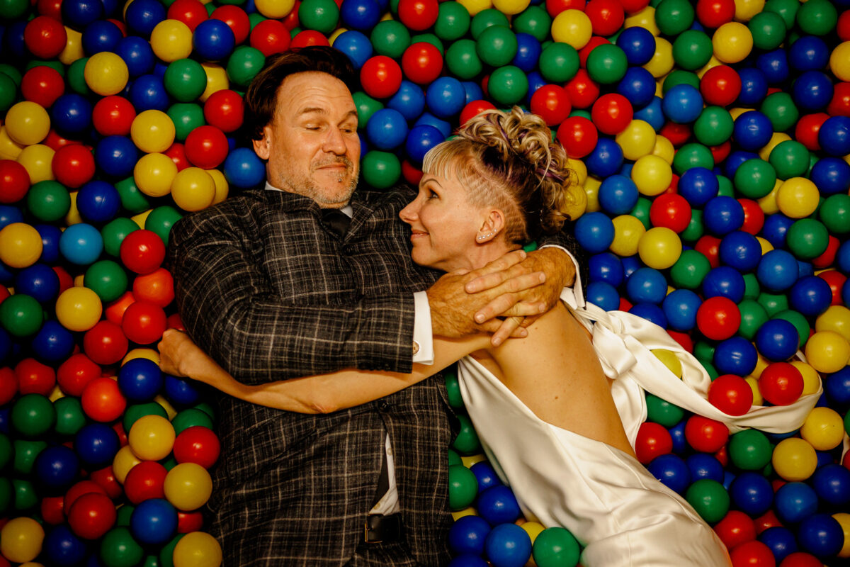 Steff and Jan in the ball pit at their bedruthan steps wedding