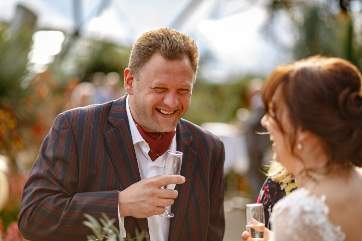 wedding guest chatting with the bride during the wedding celebrations
