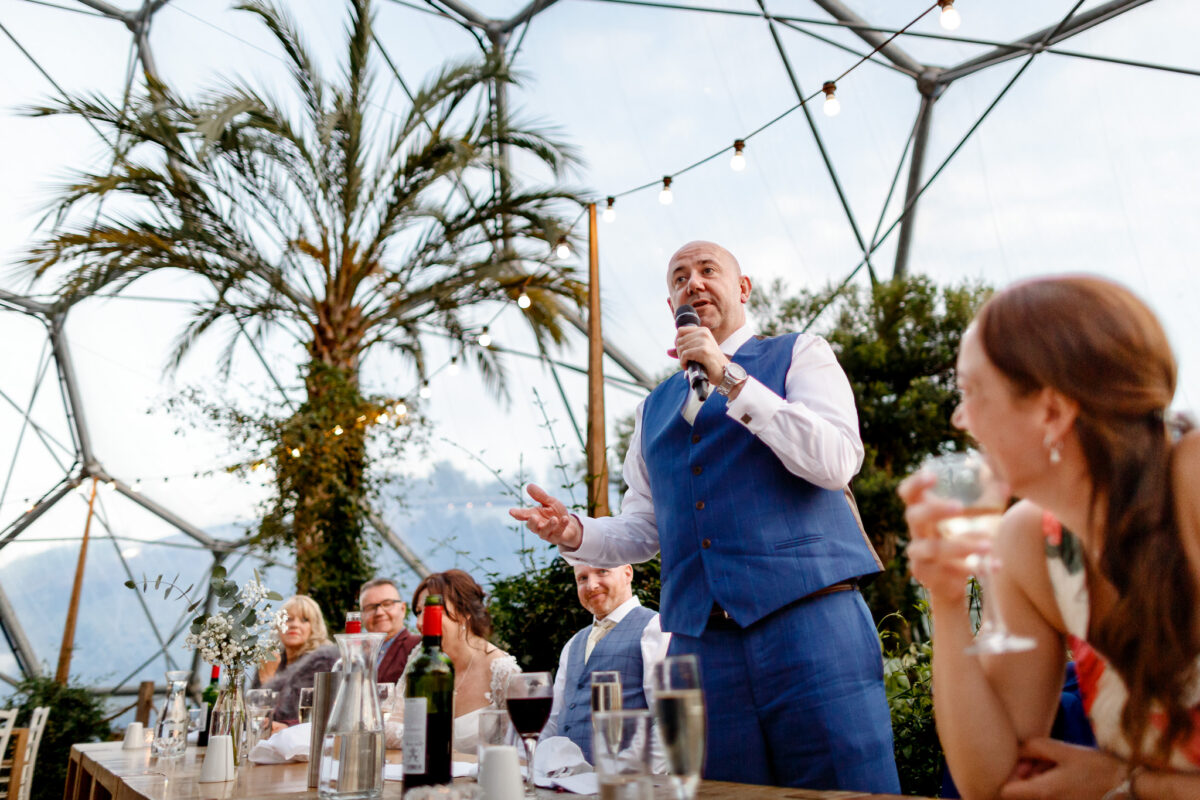 Wedding speeches beneath the palm trees at the Eden Project