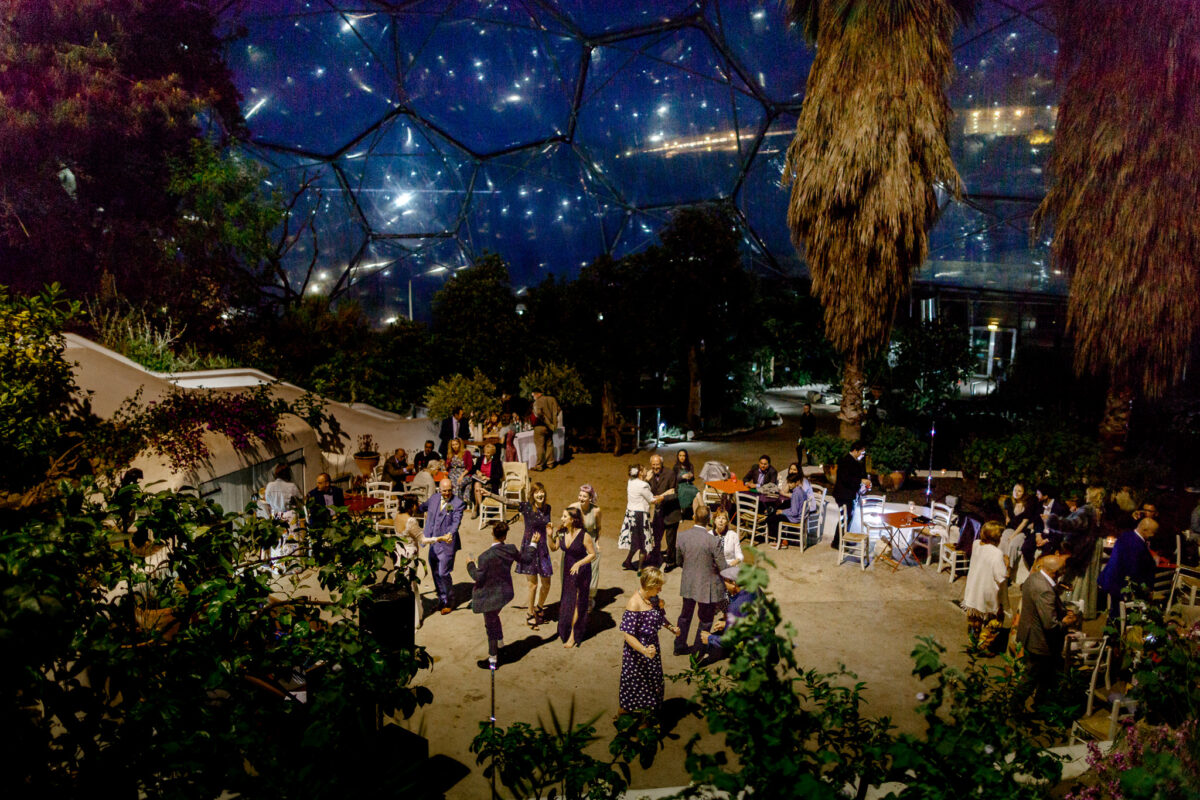 Colourful evening lighting illuminating the Eden Project Biome