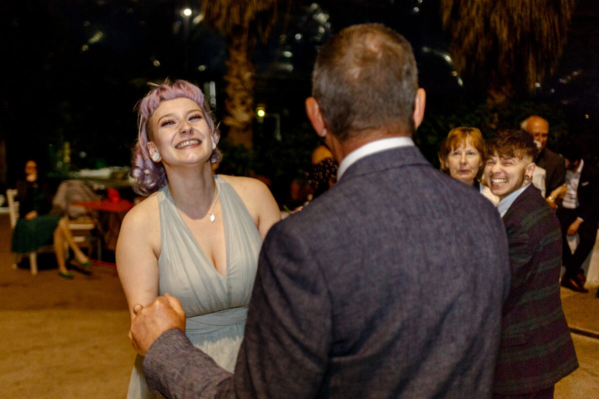 Bridesmaid smiling during the wedding reception
