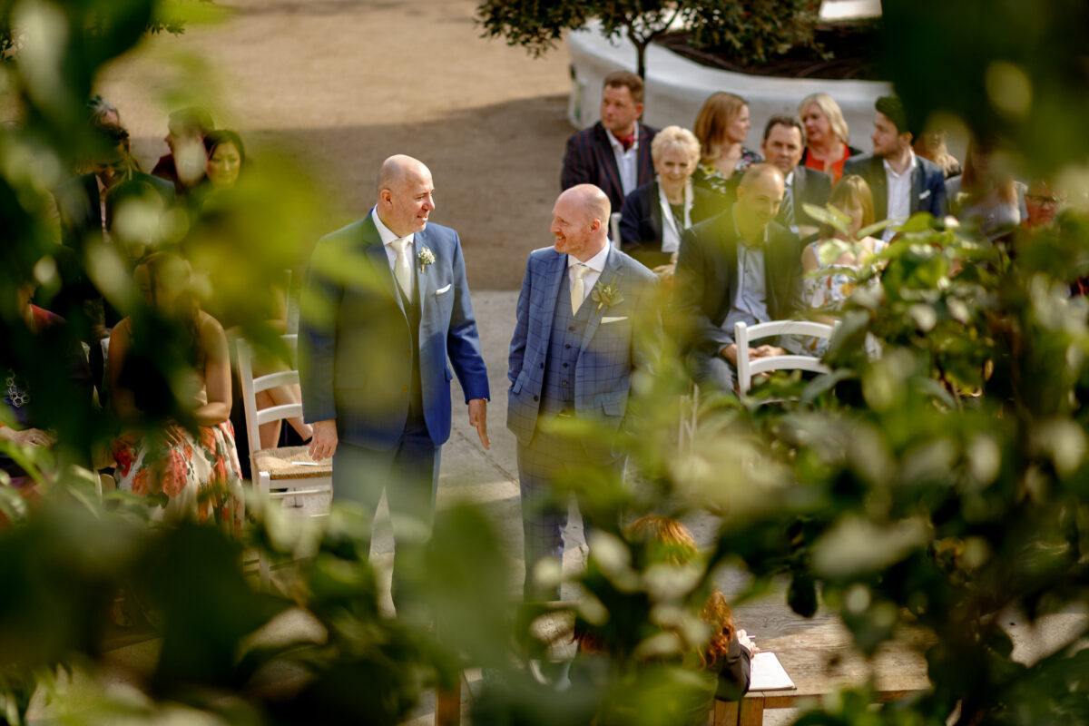 groom and best man in the biomes at the Eden Project