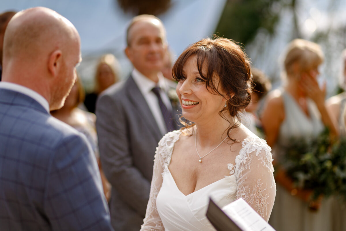 the bride looking at the groom at the Eden Project