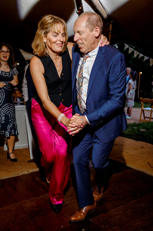 a couple dancing at a wedding