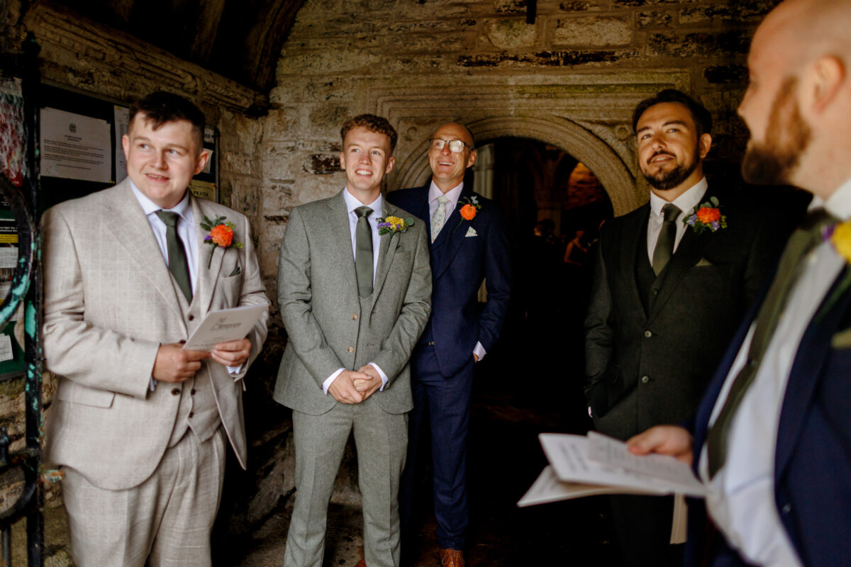 groom and groomsmen at sithney church