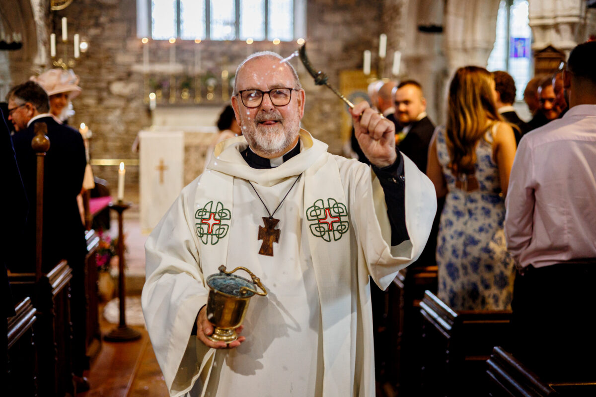 vicar at a cornish church wedding